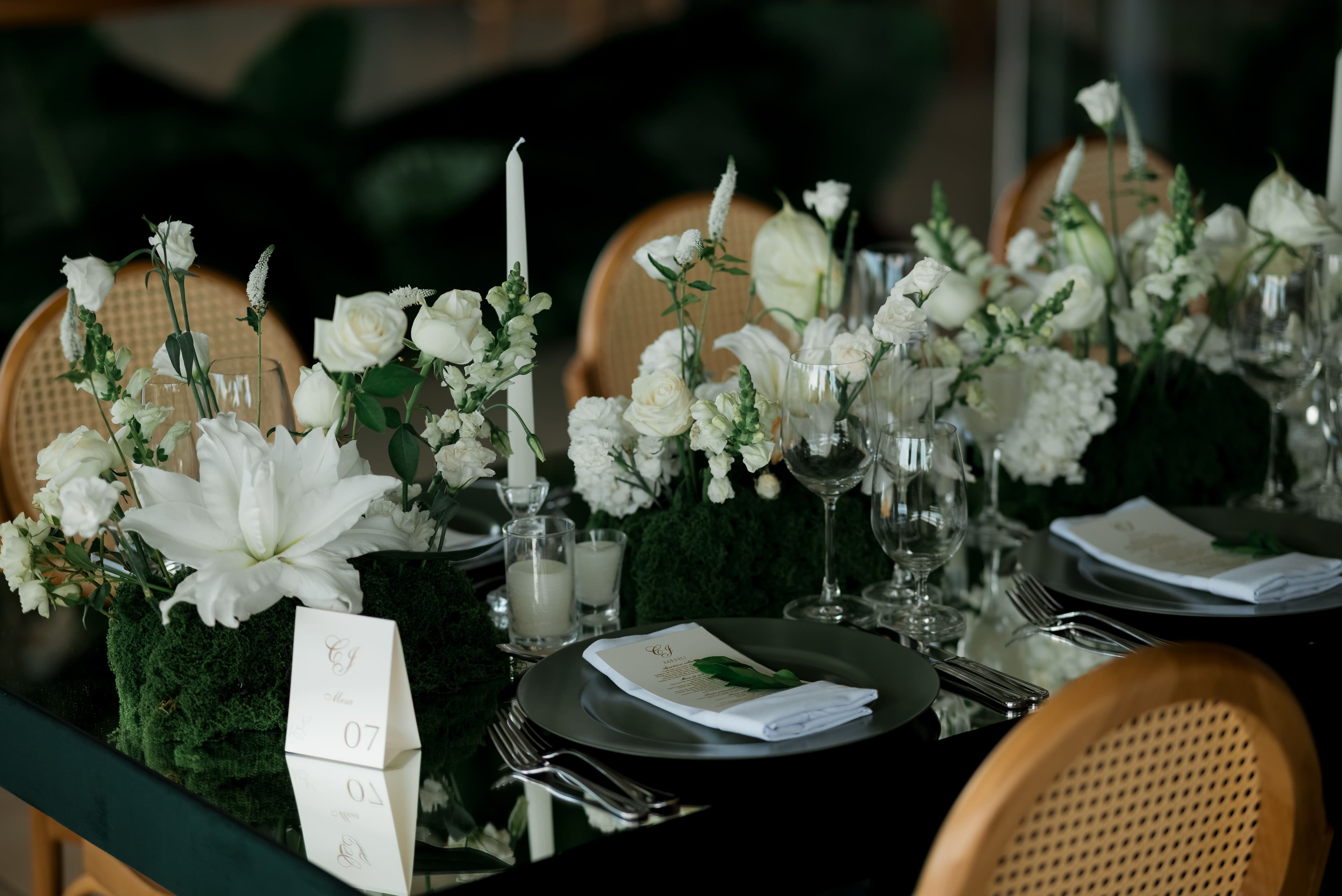 Editorial wedding reception tablescape with white flowers